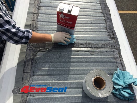 Cleaning surface to apply 4EvaSeal tape to prevent leaks in metal roofs