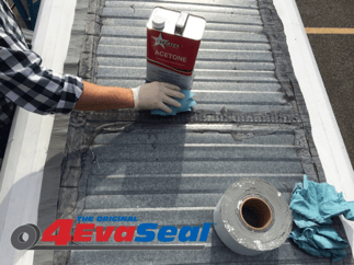 Cleaning metal roof surface
